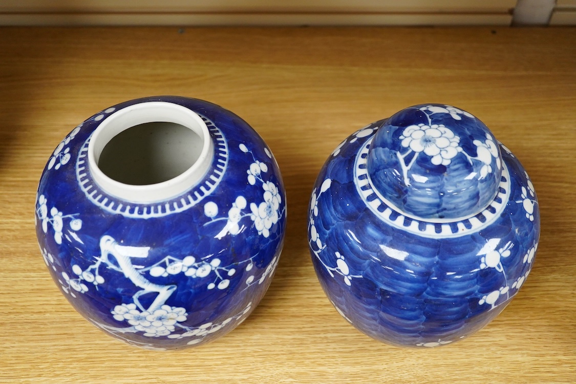 Two Chinese Prunus flower ginger jars, one with cover, 20cm high